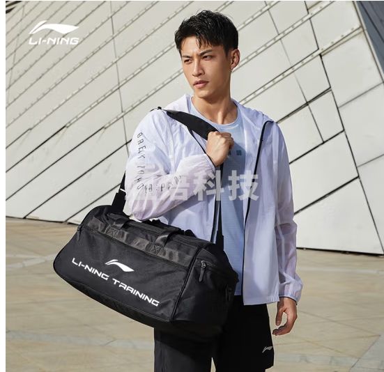 李宁（LI-NING）单肩包健身训练包桶包足球篮球运动包手拎斜挎包行李包 黑色